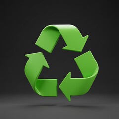 Obraz premium Green Recycling Symbol on a Dark Background