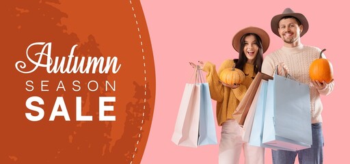 Young couple in autumn clothes, with shopping bags and pumpkins on pink background. Autumn Sale