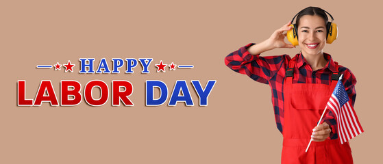 Female worker in hearing protectors with USA flag on beige background. Labor Day celebration