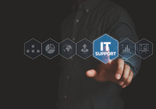 IT support concept. Businessman touching virtual interface button for technical assistance, modern technology support, technical services, help desk solutions, digital innovation, network management.