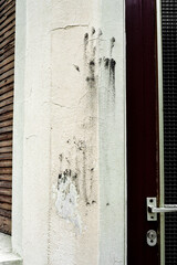 old building with paint smears