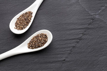 Salvia Hispanica - Nutrient chia seeds in two spoons.