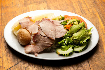 Grilled mamona, a typical Colombian-Venezuelan dish - A culinary delight from the eastern plains