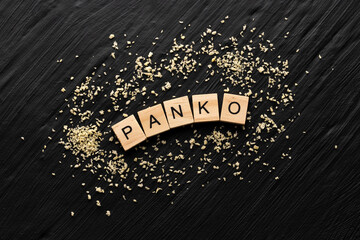 Panko, Japanese breadcrumbs scattered on a dark background