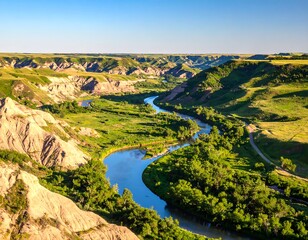 High-angle view of a meandering river through a valley
