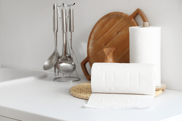 Rolls of paper towels on counter in kitchen, closeup