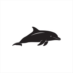 Fototapeta premium Black dolphin silhouette swimming gracefully ocean