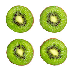 Fototapeta premium Kiwi Slices: A vibrant and appetizing display of four fresh kiwi slices, capturing the juicy freshness and appealing texture.