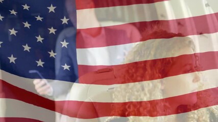 Flag graphic fading in triggers man checking smartphone for business data while woman holding gaze - Powered by Adobe