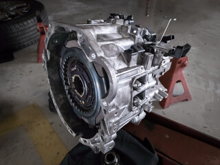 car transmission assembly being repaired, automatic transmission casing