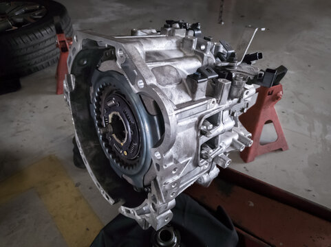 car transmission assembly being repaired, automatic transmission casing