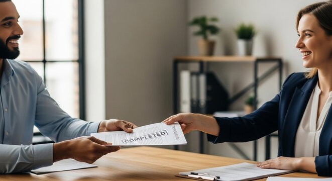Smiling People Passing Completed Document at Office Desk.