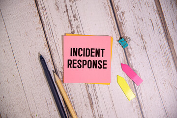 INCIDENT RESPONSE text on a notebook on green paper