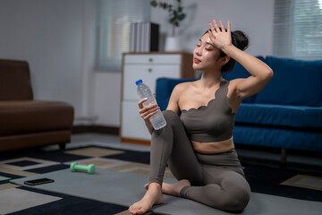 Woman relaxing after intense home workout session