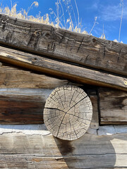 The wooden structure of a log cabin from a period of homesteading in America. 