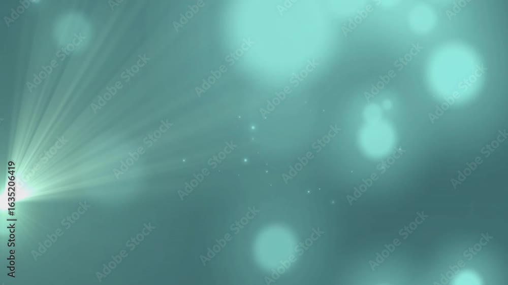 Poster teal gradient backdrop opening bokeh circles drifting as light beam emitting sparks showing glow