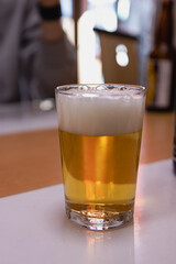 Sapporo's Winter Culinary Delight: A Plate of Fresh Sushi and Local Beer