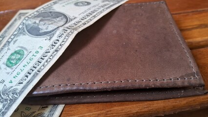 wallet with dollars