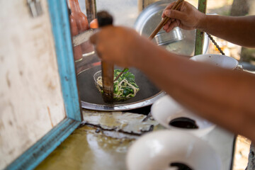 Indonesian Chicken Noodles Sold from Grobak Cart