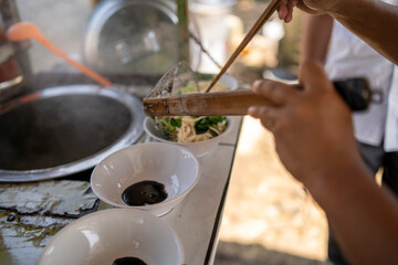 Indonesian Chicken Noodles Sold from Grobak Cart