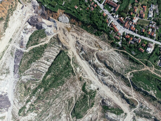 The abandoned, dead city near the Kolubara pit on coal mining by the open way. Drone view...