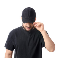 Handsome young man in stylish cap on white background