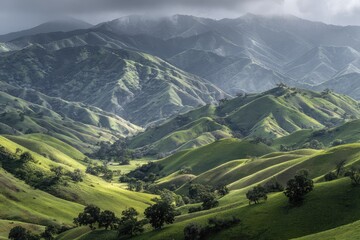 Lush green hills and mountains, sunlight filtering through clouds