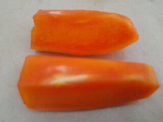 Ripe papaya slices. Fresh papaya fruit slices for healthy eating and tropical fruit nutrition benefits diet