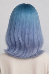 Naklejka premium Blonde woman with long, straight, shiny hair extensions in a studio, shot from the back