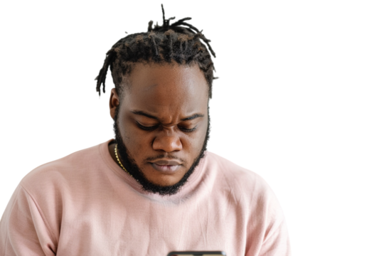 African American man with dreadlocks frowns and looks downward, ideal for social commentary, news, blogs.