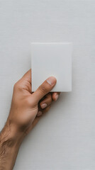 hand holding blank business card