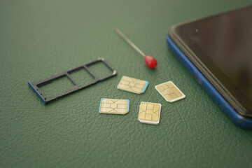 SIM cards and tools on a table ready for use