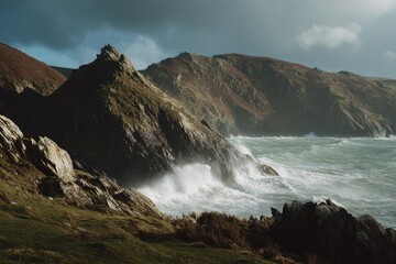 Rugged coastline with dramatic waves crashing against rocky shore, sunlit peaks