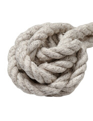 Close-up of a light beige braided rope, knotted in a circular shape
