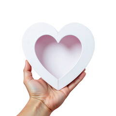 Obraz premium Hand Holding a White Heart Shaped Box for Gift or Presentation