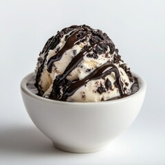 A decadent cookies and cream ice cream scoop with crumbled , 
