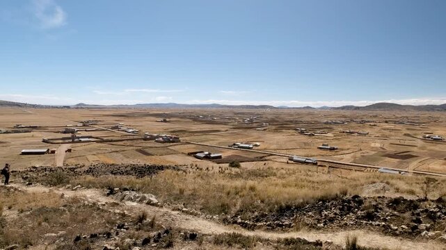 Capture the vast, breathtaking panoramic view from the Chullpas de Molloco viewpoint in Acora, Peru.