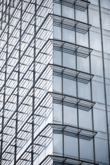 Fototapeta premium Highrise modern glass building with structural pattern in India