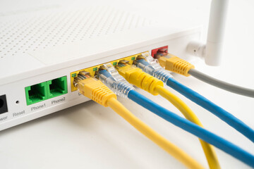 Ethernet cable with wireless router connect to internet service provider network.