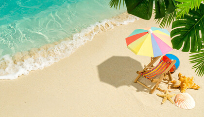 Naklejka premium Top-Down View of Tropical Beach with Sun Lounger and Umbrella