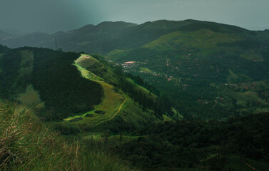 Sunlit Ridge Overlooking Verdant Valleys