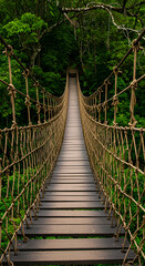 Fototapeta premium Photo of a Wooden Suspension Bridge in a Lush Green Forest with Braided Ropes