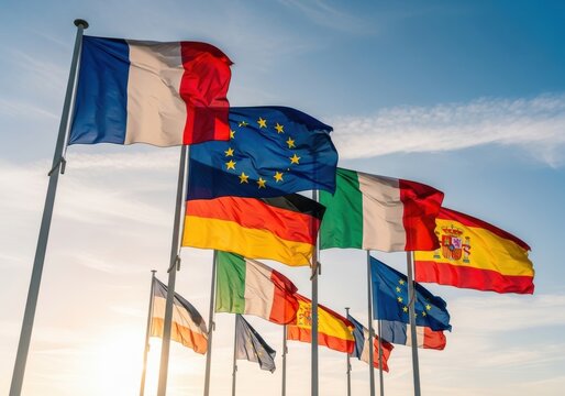 Diverse european flags waving against a clear blue sky at sunny summer day