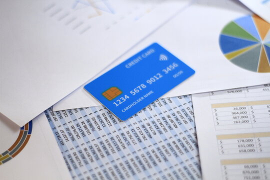 Businessman analyzing data charts and reports for marketing strategy, financial planning, accounting, and business development in modern office