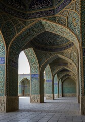 Magnificent arches adorned with intricate tilework in a historical building