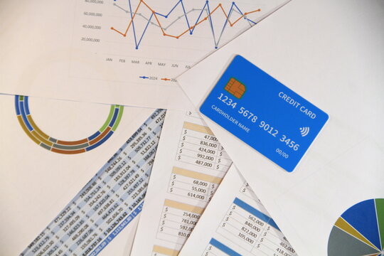 Businessman analyzing data charts and reports for marketing strategy, financial planning, accounting, and business development in modern office