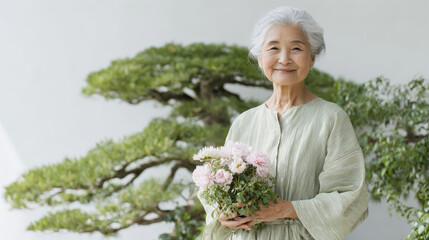 elderly japanese woman stands proudly in her bonsai garden radiating satisfaction