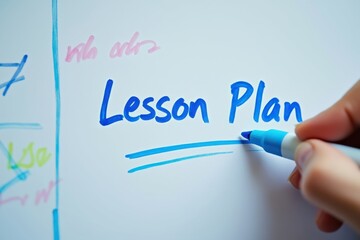 Fototapeta premium Teacher Writing Lesson Plan on Whiteboard