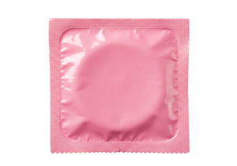 Pink condom in foil wrapper isolated on transparent background