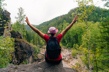 russia, zelenogorsk - 4 august 2025 Girl Raised Her Hands Up In Nature